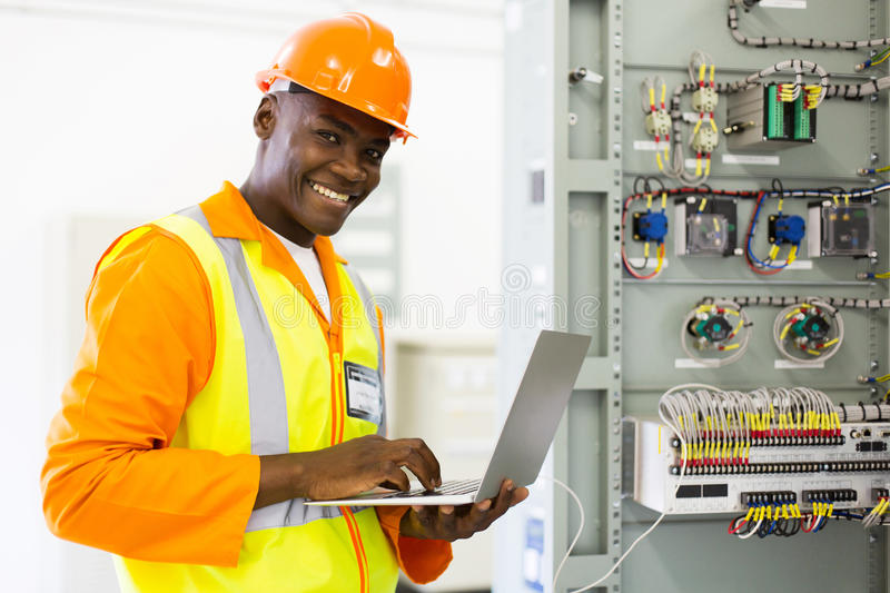 Electrician holding a laptop